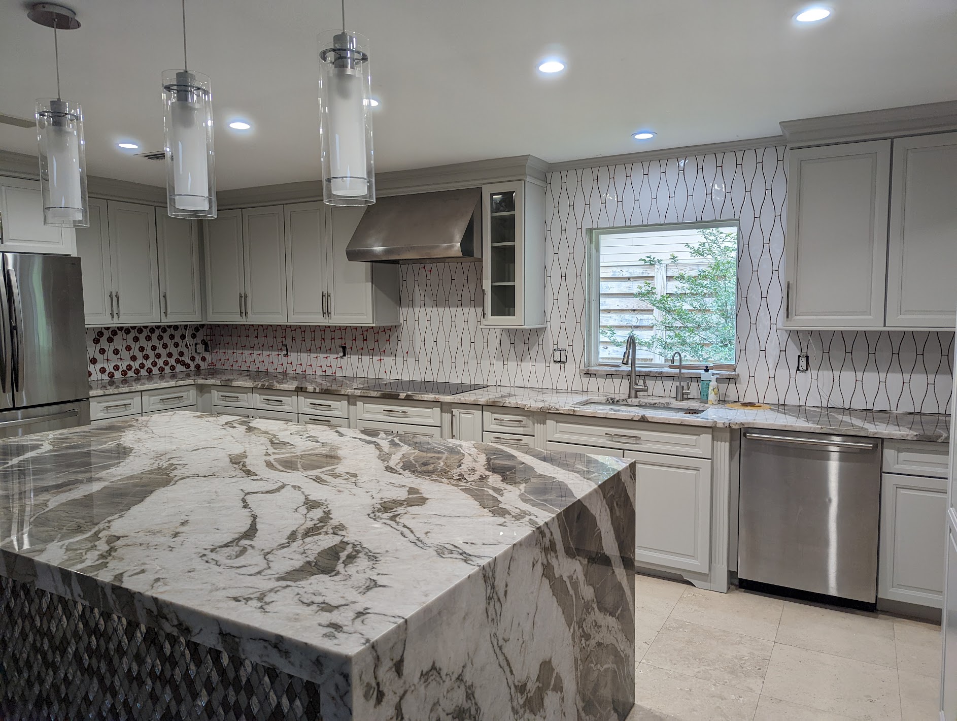 Kitchen update with custom cabinets and marble countertop by Molina Custom Works