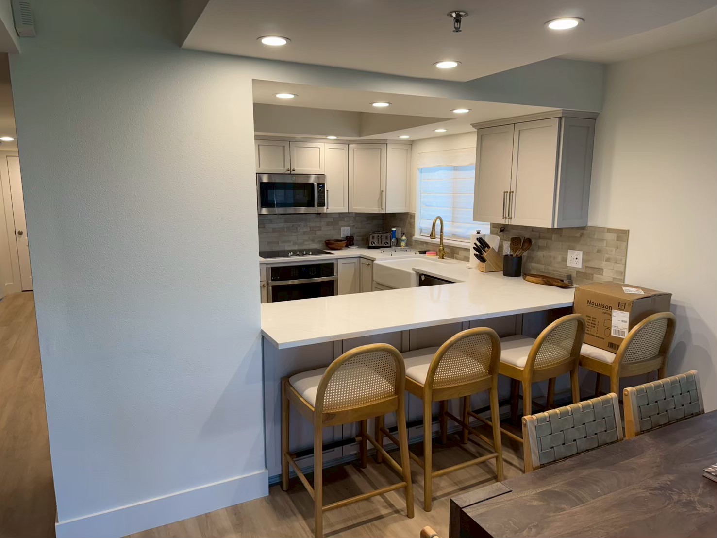 Full kitchen renovation with custom cabinetry by Molina Custom Works